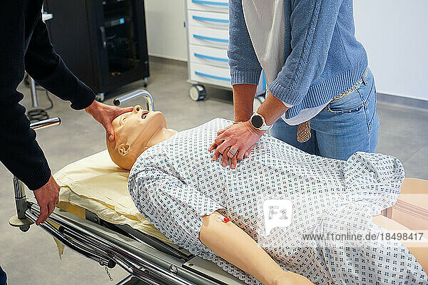 Resuscitation training on a dummy. Various health professionals are trained in the evolution of practices  care and emergency procedures within the Faculty of Medicine of Montpellier. They must work on serious cases of daily life faithfully reproduced on a SimMan dummy. Here  respiratory arrest on a man in his forties. Attempt to resuscitate with cardiac massage.