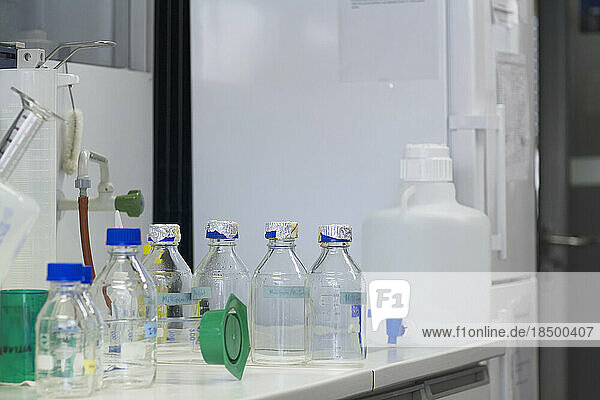 Empty bottles on machinery in a laboratory  Freiburg im Breisgau  Baden-Württemberg  Germany