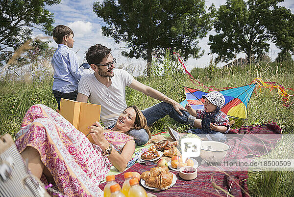 Family enjoying picnic in the countryside  Bavaria  Germany