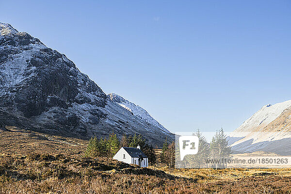 Lone white country house in the Scottish Highlands