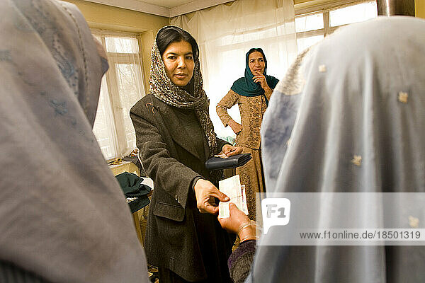 Businesswoman employs women in her sewing workshop in Kabul.