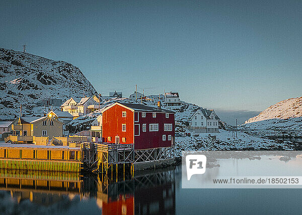 Red Houses and beautiful mountains in Stunning Norway