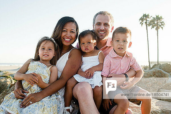 Close Up of Family of Five Posing at Beach in San Diego