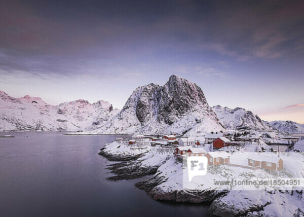 Red houses and beautiful mountain in Stunning Norway