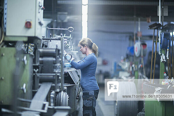 Mature woman working in the steel wool cleaner industry  Lahr  Baden-Wuerttemberg  Germany