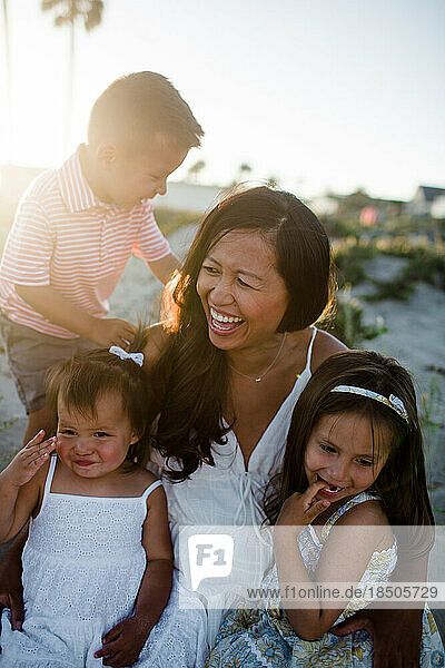 Fun Close Up of Mom & Three Kids on Beach in San Diego at Sunset