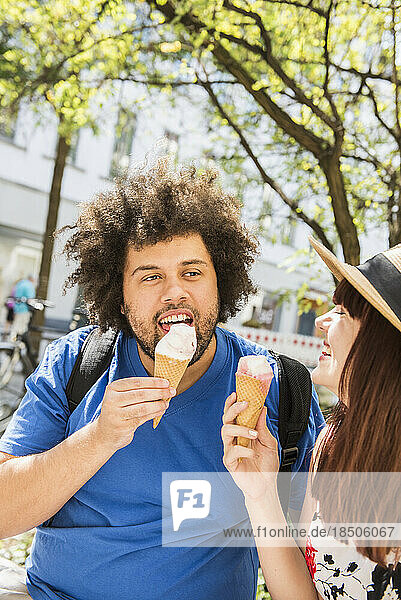 Close-up of couple eating ice cream