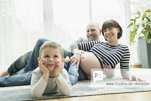 Portrait of family relaxing at home