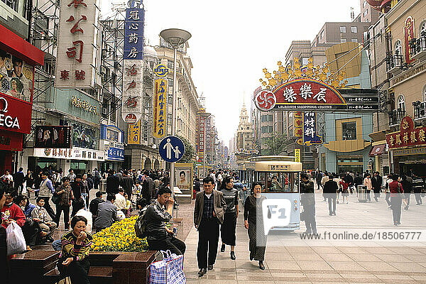 Shopping on the famous Nanjing Road with no cars and only trolleys in Shanghai China