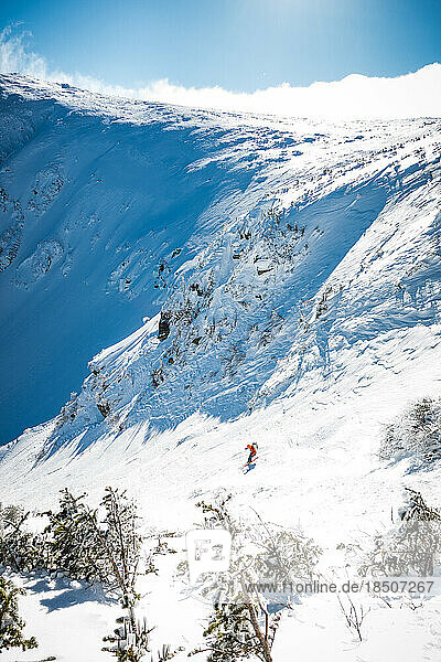 Snowy Tuckerman Ravine with skier descending Right Gully