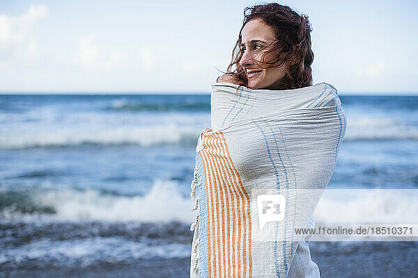 Solo Woman with towel at the beach in Puerto Rico