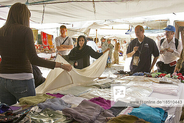 Woman sells handicraft products at a bazaar on Bagram Military Base north of Kabul.