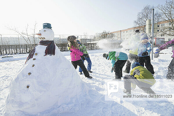Children having snow fight