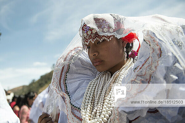 Peruvian girl with typical costume during a traditional celebration