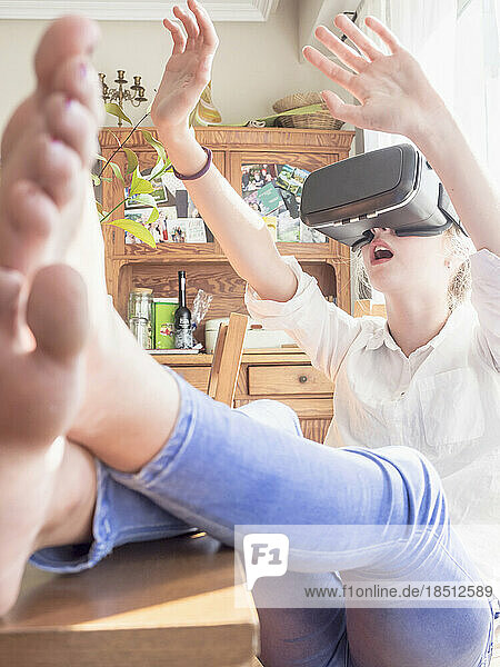 Girl wearing virtual reality glasses