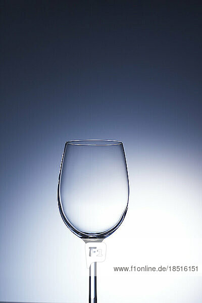 Studio shot of empty wineglass