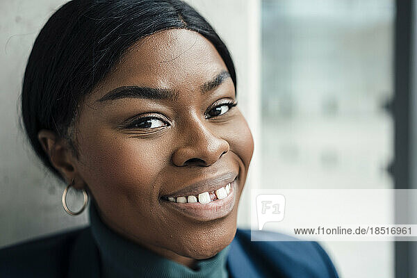 Happy young woman with gap toothed