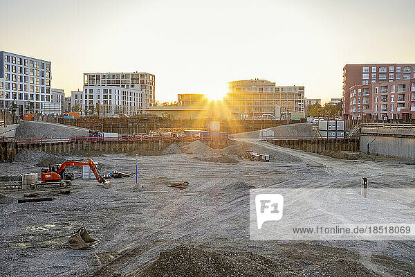Sunset over empty under construction site