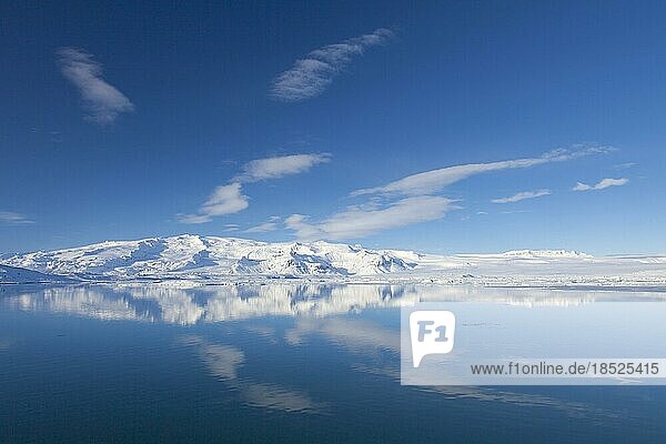Snow covered mountains along the Jökulsárlón glacier lagoon in winter  glacial lake in southeast Iceland