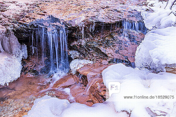 Frozen creek in winter in Zion National Park