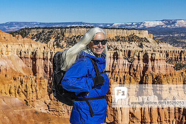 United States  Utah  Bryce Canyon National Park  Senior blonde woman hiking