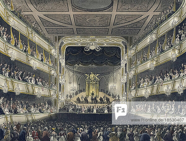 Covent Garden Theatre. Circa 1808. After a work by August Pugin and Thomas Rowlandson in the Microcosm of London  published in three volumes between 1808 and 1810 by Rudolph Ackermann. Pugin was the artist responsible for the architectural elements in the Microcosm pictures; Thomas Rowlandson was hired to add the lively human figures.
