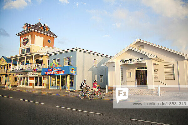 Waterfront businesses and cyclists in George Town  Cayman Islands; George Town  Grand Cayman  Cayman Islands