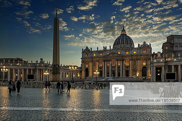 People in front of St. Peter's Basilica in the evening light  Rome  Lazio  Italy  Europe