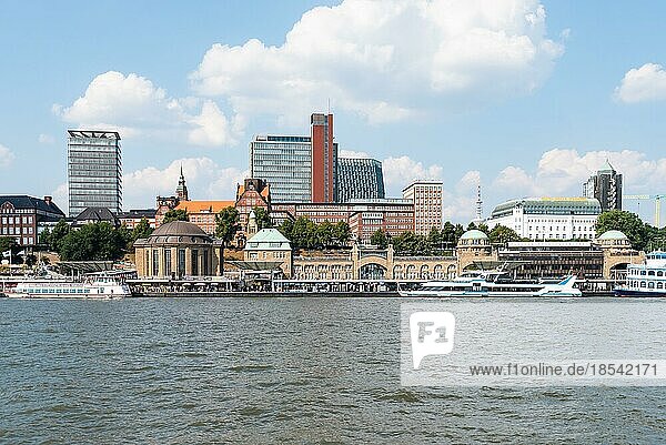 2020-08-16 Hamburg  Germany: waterside view of famous St. Pauli Piers and River Elbe against blue summer sky