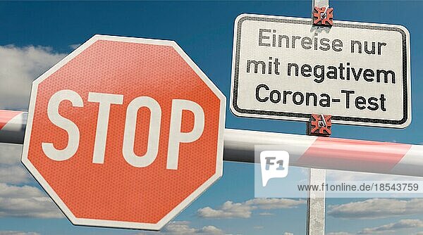 Schild: Einreise nur mit negativem Corona-Test. Stop sign and German info sign: