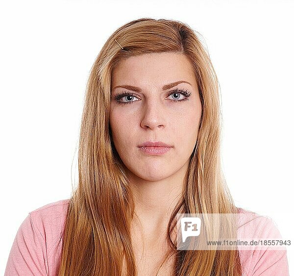 young woman with neutral expression headshot