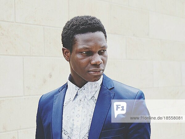 portrait of a stylish young man of african descent. faded color filter