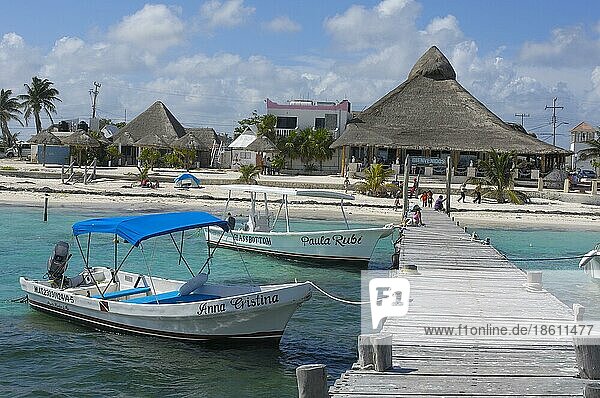 Fishing boats on the jetty  Puerto Morelos beach  Riviera Maya  Quintana Roo  Yucatan  Mexico  Central America