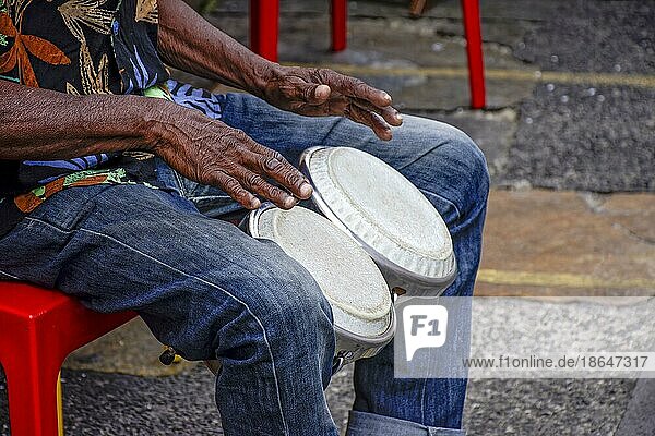 Percussionist playing bongo in the streets of historic Pelourinho district in Salvador  Bahia  Brasil