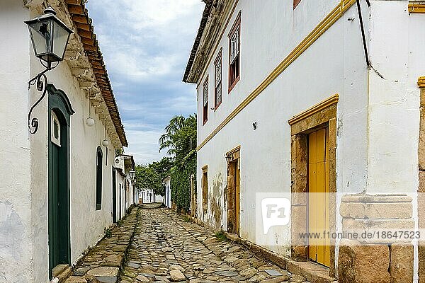 Traditional street in the historic city of Paraty in the state of Rio de Janeiro with cobblestone pavement and colonial style houses  Brasil