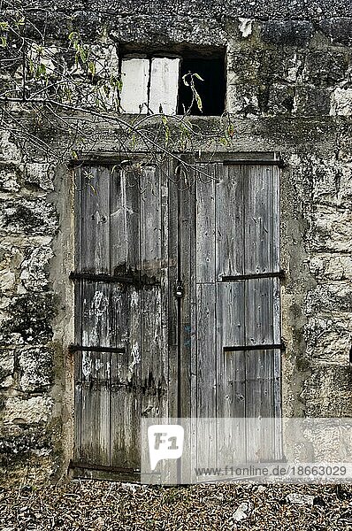 Abandoned and ecayed house with wooden doors in Byblos Lebanon Middle East