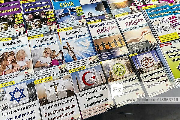 Basic knowledge of religion  Christianity  Islam  Buddhism  diverse selection of books by Fachverlag Kohl  Messe Didacta  Stuttgart  Baden-Württemberg  Germany  Europe