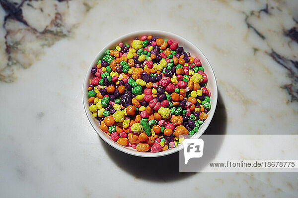 Still life of vibrant  multicolored candy in bowl