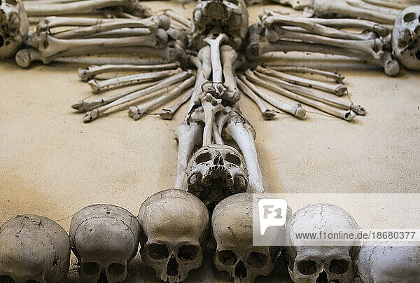 Decoration made of human skulls and bones  interior of Sedlec Ossuary  UNESCO World Heritage Site  Kutna Hora  Czech Republic (Czechia)  Europe