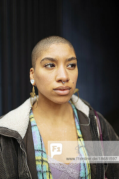 Hipster young woman with shaved head