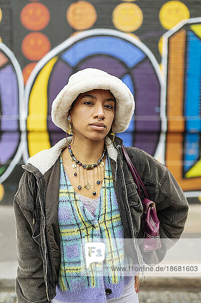 Portrait of hipster young woman in bucket hat
