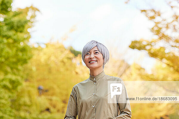 Senior Japanese woman at a city park