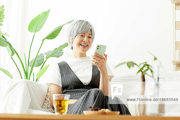 Senior Japanese woman at home