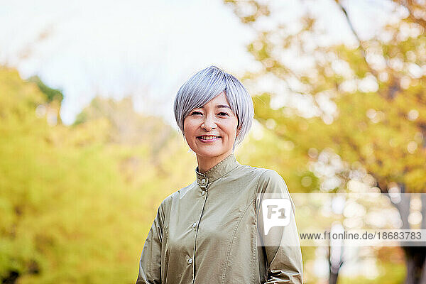 Senior Japanese woman at a city park