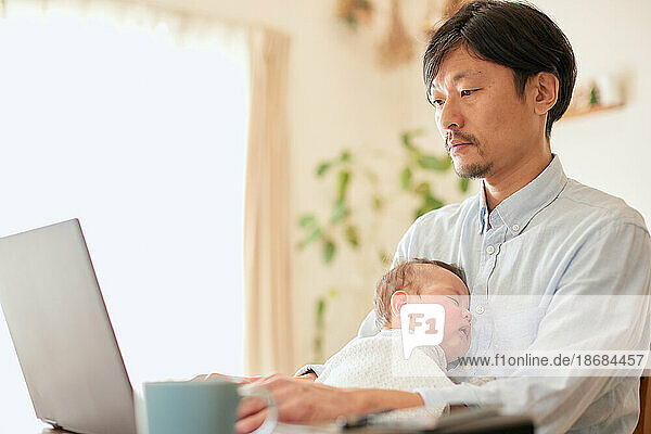 Japanese father and newborn