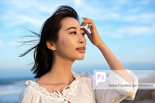 Japanese woman portrait at the beach