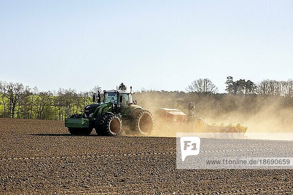 Maize sowing precision drill Vaederstad Tempo  12 rows  spacing 75 cm  8 K??rner per square metre pulled by tractor Fendt 936 with 360 hp  Meyenburg  Germany  Europe