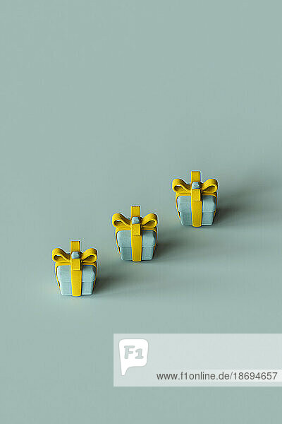 3D render of Christmas presents lying against green background