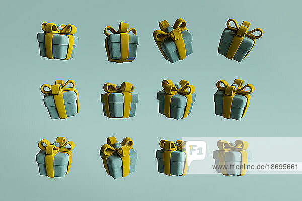 3D render of Christmas presents floating against green background