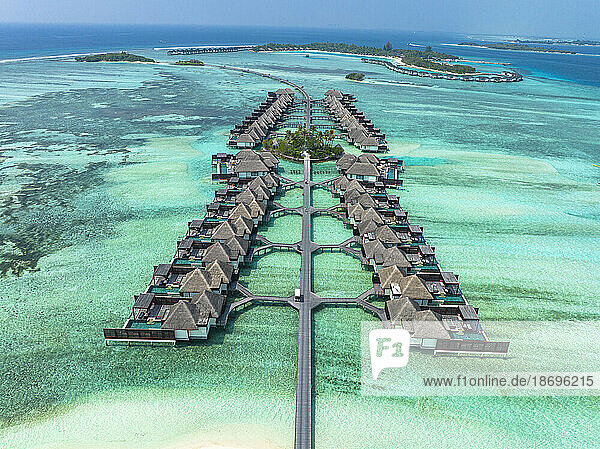 Water bungalows in rows at Kuda Huraa in Maldives